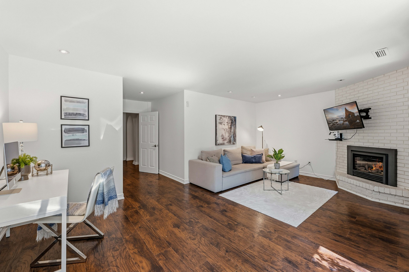 Open-concept living room with fireplace